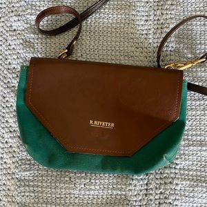 R. Riveter crossbody. Slightly used. Small.